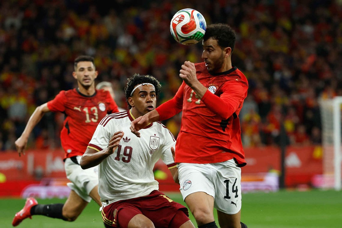 Spain's Lamine Yamal, left, challenges for the ball with Egypt's Hamdy Fathy during the international friendly soccer match between Spain and Egypt in Barcelona, Spain, Tuesday, March 31, 2026. (AP Photo/Joan Monfort) Spain's Lamine Yamal, left, challenges for the ball with Egypt's Hamdy Fathy during the international friendly soccer match between Spain and Egypt in Barcelona, Spain, Tuesday, March 31, 2026. (AP Photo/Joan Monfort)