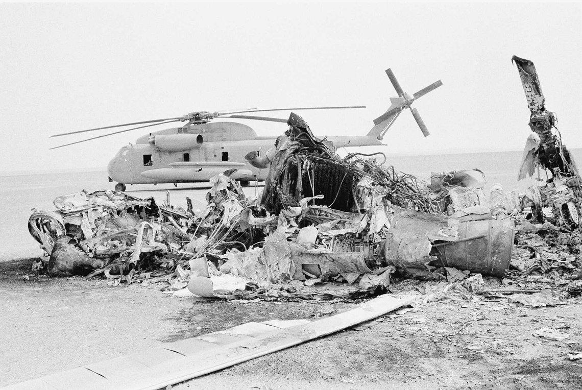 FILE - Remains of a burned-out U.S. helicopter lis photographed in the eastern desert region of Iran, April 27,1980, one day after an abortive American commando raid to free the U.S. Embassy hostages. (AP Photo, File) FILE - Remains of a burned-out U.S. helicopter lis photographed in the eastern desert region of Iran, April 27,1980, one day after an abortive American commando raid to free the U.S. Embassy hostages. (AP Photo, File)