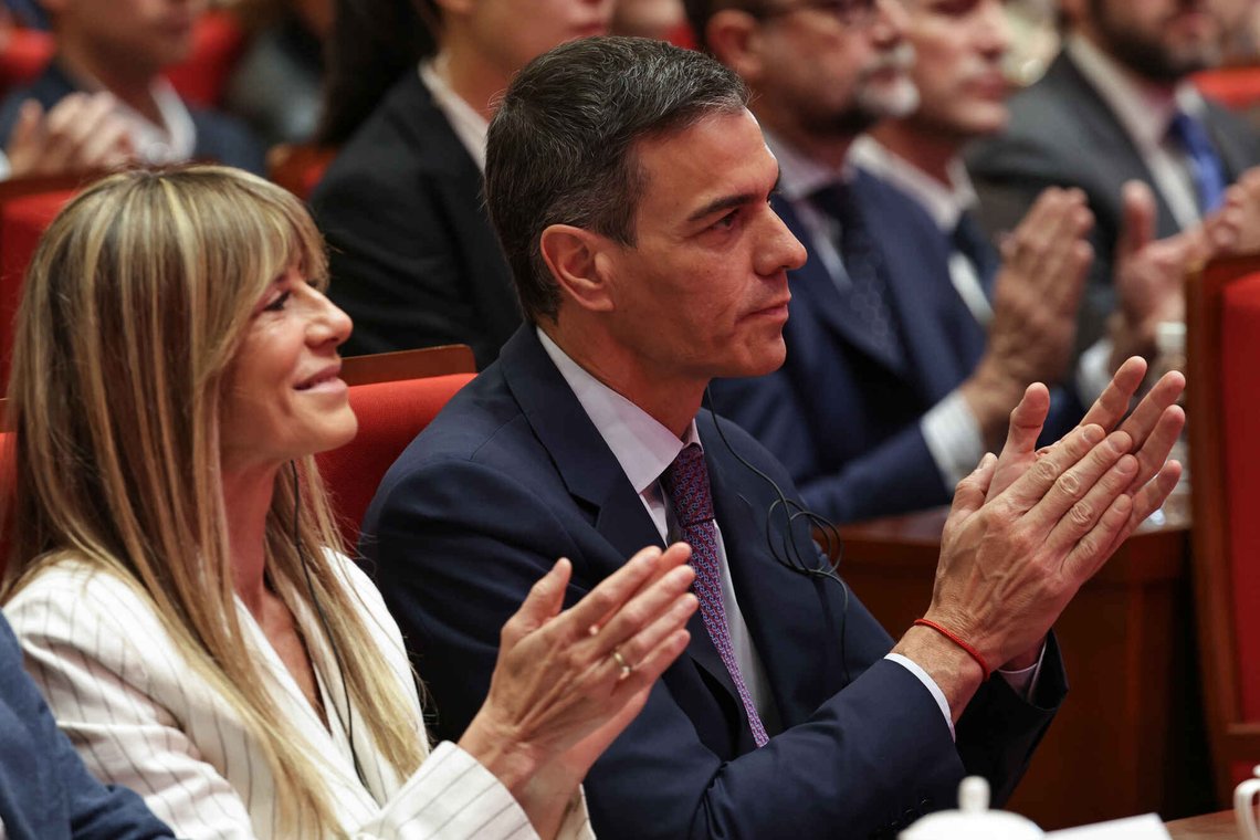 Spanish Prime Minister Pedro Sanchez and his wife Begona Gomez attend a speech at Tsinghua University in Beijing, Monday, April 13, 2026. (Andres Martinez Casares/Pool Photo via AP) Spanish Prime Minister Pedro Sanchez and his wife Begona Gomez attend a speech at Tsinghua University in Beijing, Monday, April 13, 2026. (Andres Martinez Casares/Pool Photo via AP)