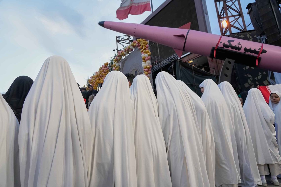 A group of girls stand beside a "Khaybar-buster" missile during a mass wedding ceremony for couples participating in the "Janfada" ("Sacrifice for Iran") pro-government campaign in Tehran, Iran, Monday, May 18, 2026. (AP Photo/Vahid Salemi) A group of girls stand beside a "Khaybar-buster" missile during a mass wedding ceremony for couples participating in the "Janfada" ("Sacrifice for Iran") pro-government campaign in Tehran, Iran, Monday, May 18, 2026. (AP Photo/Vahid Salemi)