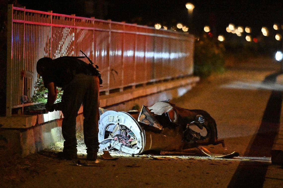 Israeli security forces examine a fragment of an intercepted Iranian missile in northern Israel, early Monday, June 8, 2026. (AP Photo/Rami Shlush) Israeli security forces examine a fragment of an intercepted Iranian missile in northern Israel, early Monday, June 8, 2026. (AP Photo/Rami Shlush)