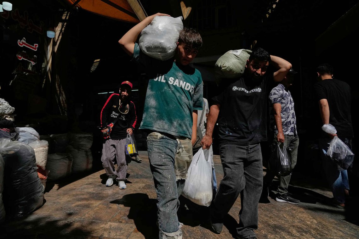 People carry packages at Tehran's historic Grand Bazaar, Iran, Monday, June 1, 2026. (AP Photo/Vahid Salemi) People carry packages at Tehran's historic Grand Bazaar, Iran, Monday, June 1, 2026. (AP Photo/Vahid Salemi)