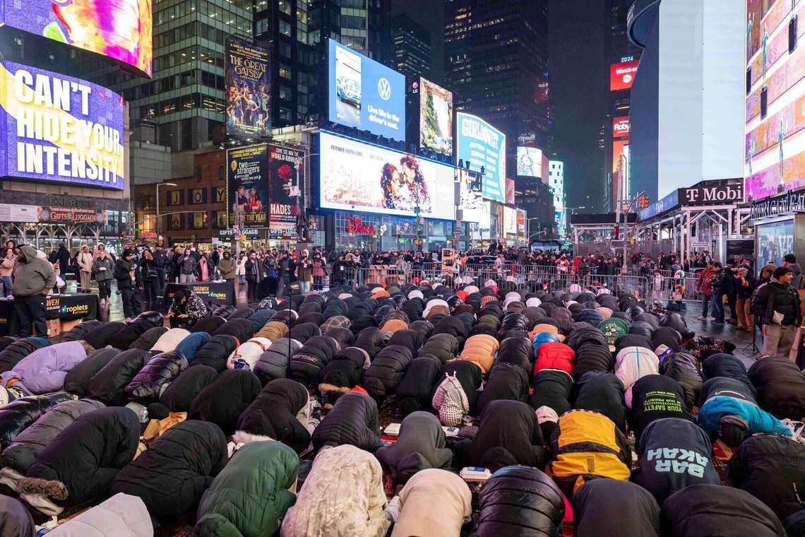 Members of the Muslim community pray during a month of Ramadan in Times Square, Friday, Feb. 20, 2026, in New York. (AP Photo/Yuki Iwamura) Members of the Muslim community pray during a month of Ramadan in Times Square, Friday, Feb. 20, 2026, in New York. (AP Photo/Yuki Iwamura)