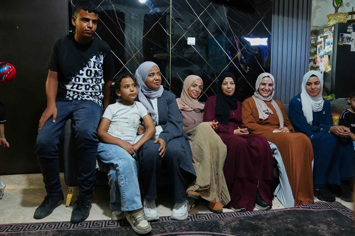 Mais Al-Gharam, second from right, poses for a photo with her six siblings from Gaza, who were granted Israeli passports, in her home in Nazareth, Israel, Wednesday, July 8, 2026. (AP Photo/Mahmoud Illean) Mais Al-Gharam, second from right, poses for a photo with her six siblings from Gaza, who were granted Israeli passports, in her home in Nazareth, Israel, Wednesday, July 8, 2026. (AP Photo/Mahmoud Illean)