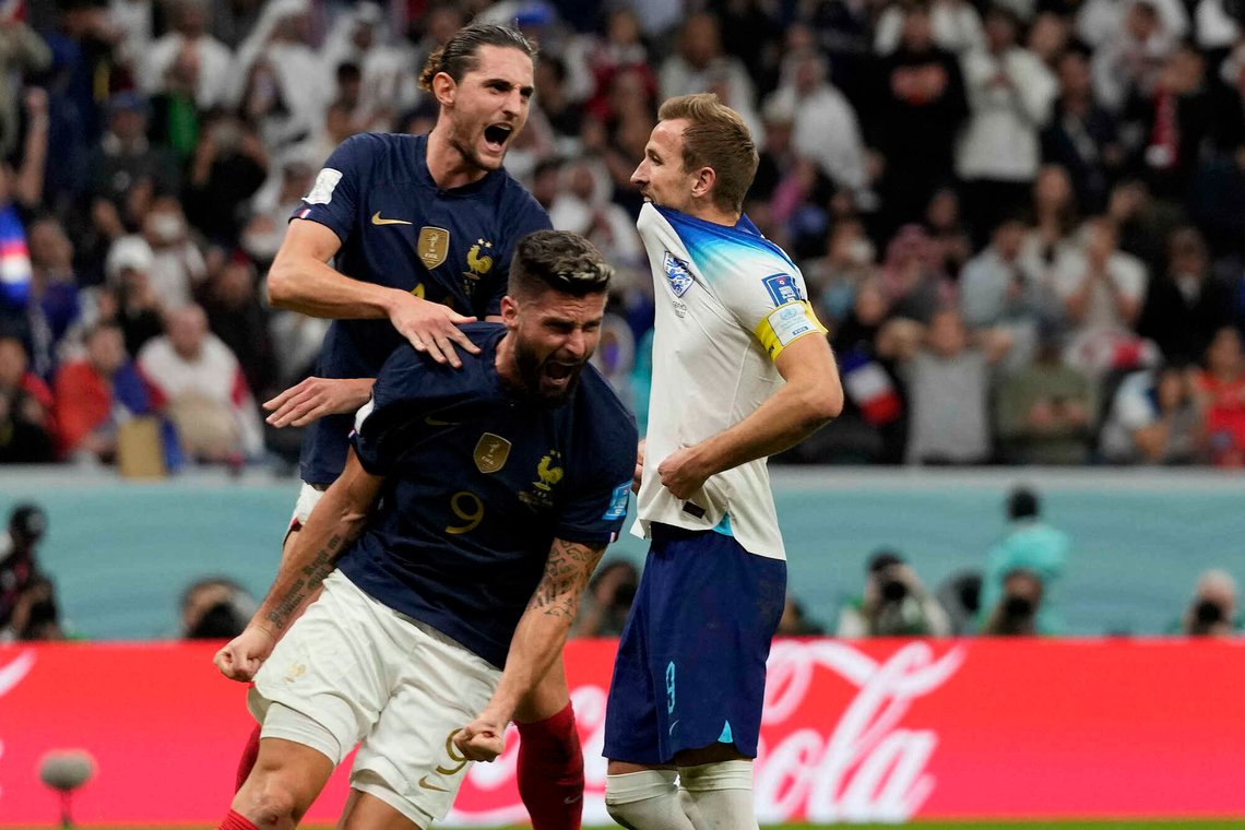 France's Adrien Rabiot , top, and France's Olivier Giroud celebrate after England's Harry Kane missed a penalty kick during the World Cup quarterfinal soccer match between England and France, at the Al Bayt Stadium in Al Khor, Qatar, Saturday, Dec. 10, 2022. (AP Photo/Frank Augstein) France's Adrien Rabiot , top, and France's Olivier Giroud celebrate after England's Harry Kane missed a penalty kick during the World Cup quarterfinal soccer match between England and France, at the Al Bayt Stadium in Al Khor, Qatar, Saturday, Dec. 10, 2022. (AP Photo/Frank Augstein)