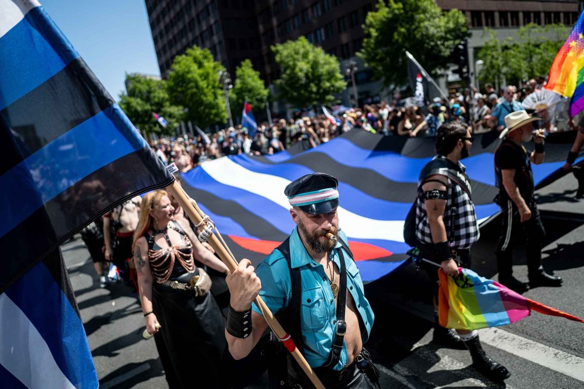 People carry a "Leather Pride Flag" during the Christopher Street Day parade in Berlin, on Saturday, July 25, 2026. (Fabian Sommer/dpa via AP) People carry a "Leather Pride Flag" during the Christopher Street Day parade in Berlin, on Saturday, July 25, 2026. (Fabian Sommer/dpa via AP)