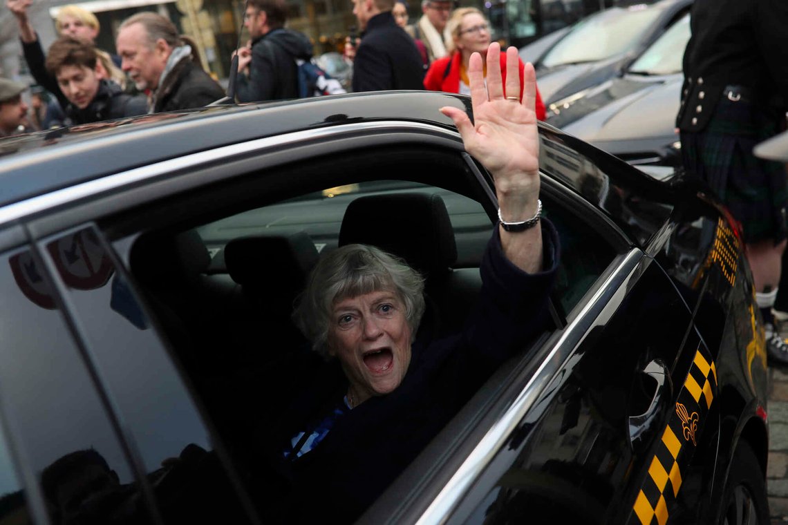 British MEP Ann Widdecombe gestures as she leaves with other party members the European Parliament in Brussels to take the Eurostar train back to Britain, Friday, Jan. 31, 2020. The U.K. is due to leave the EU on Friday the first nation in the bloc to do so. (AP Photo/Francisco Seco) British MEP Ann Widdecombe gestures as she leaves with other party members the European Parliament in Brussels to take the Eurostar train back to Britain, Friday, Jan. 31, 2020. The U.K. is due to leave the EU on Friday the first nation in the bloc to do so. (AP Photo/Francisco Seco)