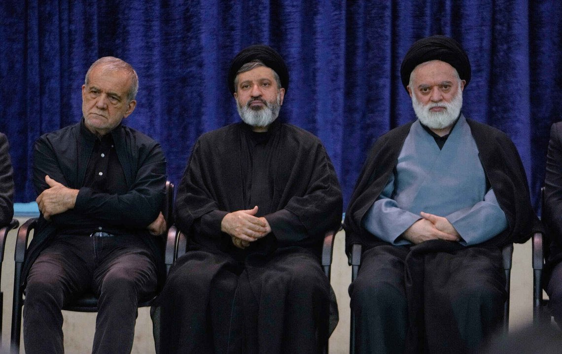 President Masoud Pezeshkian, left, sons of the late Supreme Leader Ayatollah Ali Khamenei, Masoud, center, and Mostafa, attend a ceremony to commemorate the late leader at the Imam Khomeini Mosalla Grand Mosque in Tehran, Tuesday, July 14, 2026. (AP Photo/Vahid Salemi) President Masoud Pezeshkian, left, sons of the late Supreme Leader Ayatollah Ali Khamenei, Masoud, center, and Mostafa, attend a ceremony to commemorate the late leader at the Imam Khomeini Mosalla Grand Mosque in Tehran, Tuesday, July 14, 2026. (AP Photo/Vahid Salemi)