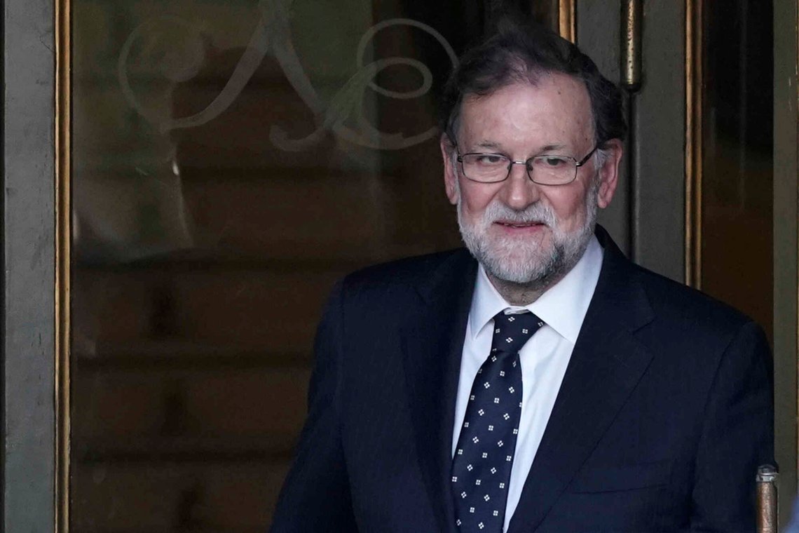 Former Spanish Prime Minister Mariano Rajoy leaves the Supreme Court, after testifying in the ongoing trial of Catalan separatists in Madrid, Spain, Wednesday, Feb. 27, 2019. Former Spanish Prime Minister Mariano Rajoy made a strident defence of Spain's national unity Wednesday when he appeared as a witness at the trial of a dozen Catalan separatists. (AP Photo/Andrea Comas) Former Spanish Prime Minister Mariano Rajoy leaves the Supreme Court, after testifying in the ongoing trial of Catalan separatists in Madrid, Spain, Wednesday, Feb. 27, 2019. Former Spanish Prime Minister Mariano Rajoy made a strident defence of Spain's national unity Wednesday when he appeared as a witness at the trial of a dozen Catalan separatists. (AP Photo/Andrea Comas)