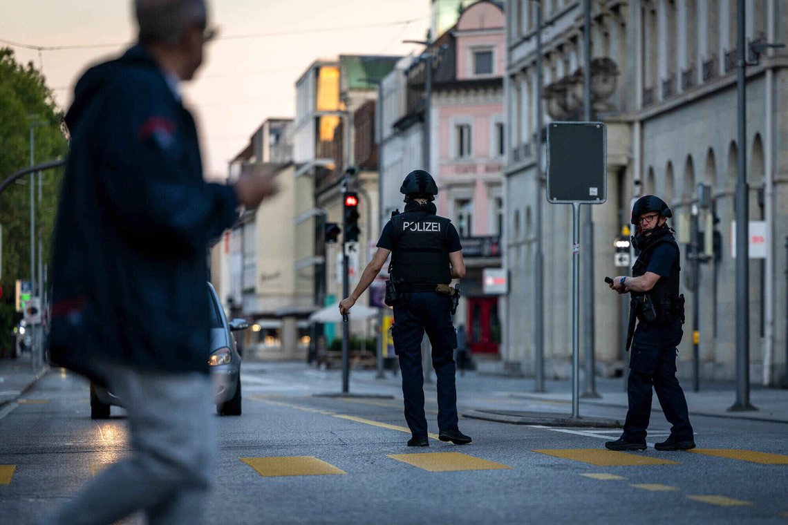 Police officers patrol a street in downtown Aarau, Switzerland Sunday, Aug. 30, 2026, following a shooting at a rave. (Michael Buholzer/Keystone via AP) Police officers patrol a street in downtown Aarau, Switzerland Sunday, Aug. 30, 2026, following a shooting at a rave. (Michael Buholzer/Keystone via AP)