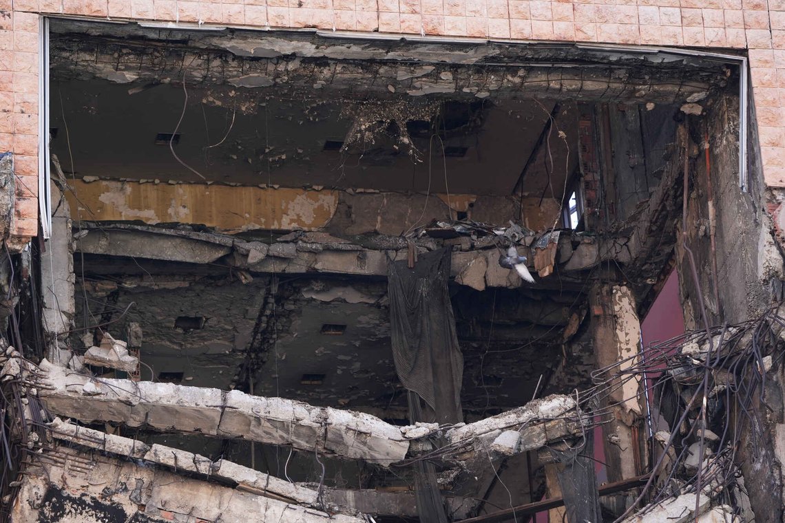 A pigeon flies through former Yugoslav army headquarters destroyed in a U.S.-led NATO bombing campaign in 1999, left, is seen in Belgrade, Serbia, Tuesday, Nov. 4, 2025. (AP Photo/Darko Vojinovic) A pigeon flies through former Yugoslav army headquarters destroyed in a U.S.-led NATO bombing campaign in 1999, left, is seen in Belgrade, Serbia, Tuesday, Nov. 4, 2025. (AP Photo/Darko Vojinovic)