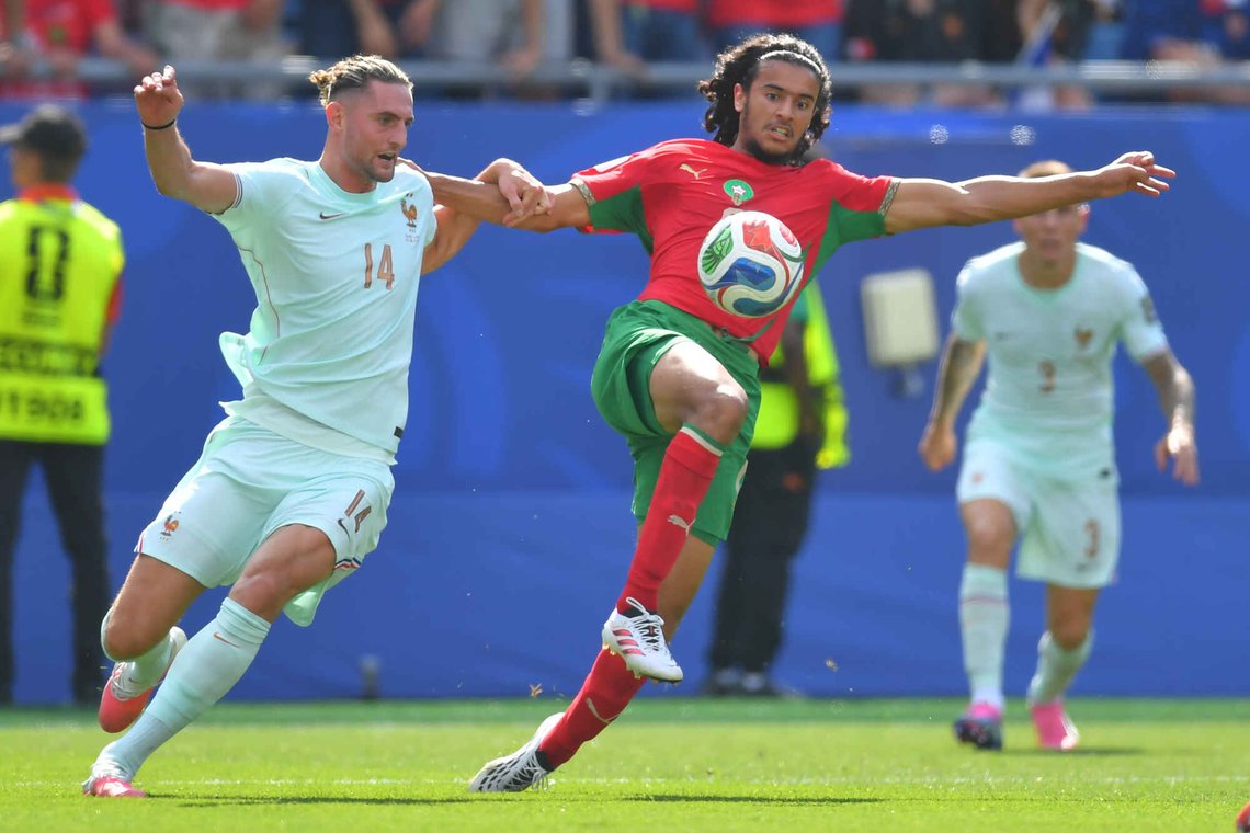 France's Adrien Rabiot (14) and Morocco's Ayyoub Bouaddi (6) fight for the ball during the World Cup quarterfinal soccer match between France and Morocco in Foxborough, Mass., near Boston, Thursday, July 9, 2026. (AP Photo/Steven Senne) France's Adrien Rabiot (14) and Morocco's Ayyoub Bouaddi (6) fight for the ball during the World Cup quarterfinal soccer match between France and Morocco in Foxborough, Mass., near Boston, Thursday, July 9, 2026. (AP Photo/Steven Senne)