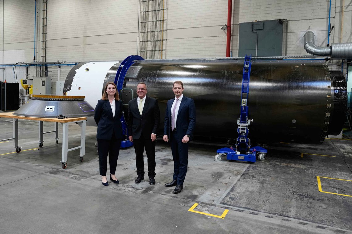 Isar Aerospace CEO Daniel Metzler, right, German Defence Minister Boris Pistorius, center, and Andronike Amponsah, Vice President Defense and Government Programs, pose for a photo during a visit to Isar Aerospace in Munich, Germany, Thursday, July 23, 2026. (AP Photo/Matthias Schrader) Isar Aerospace CEO Daniel Metzler, right, German Defence Minister Boris Pistorius, center, and Andronike Amponsah, Vice President Defense and Government Programs, pose for a photo during a visit to Isar Aerospace in Munich, Germany, Thursday, July 23, 2026. (AP Photo/Matthias Schrader)