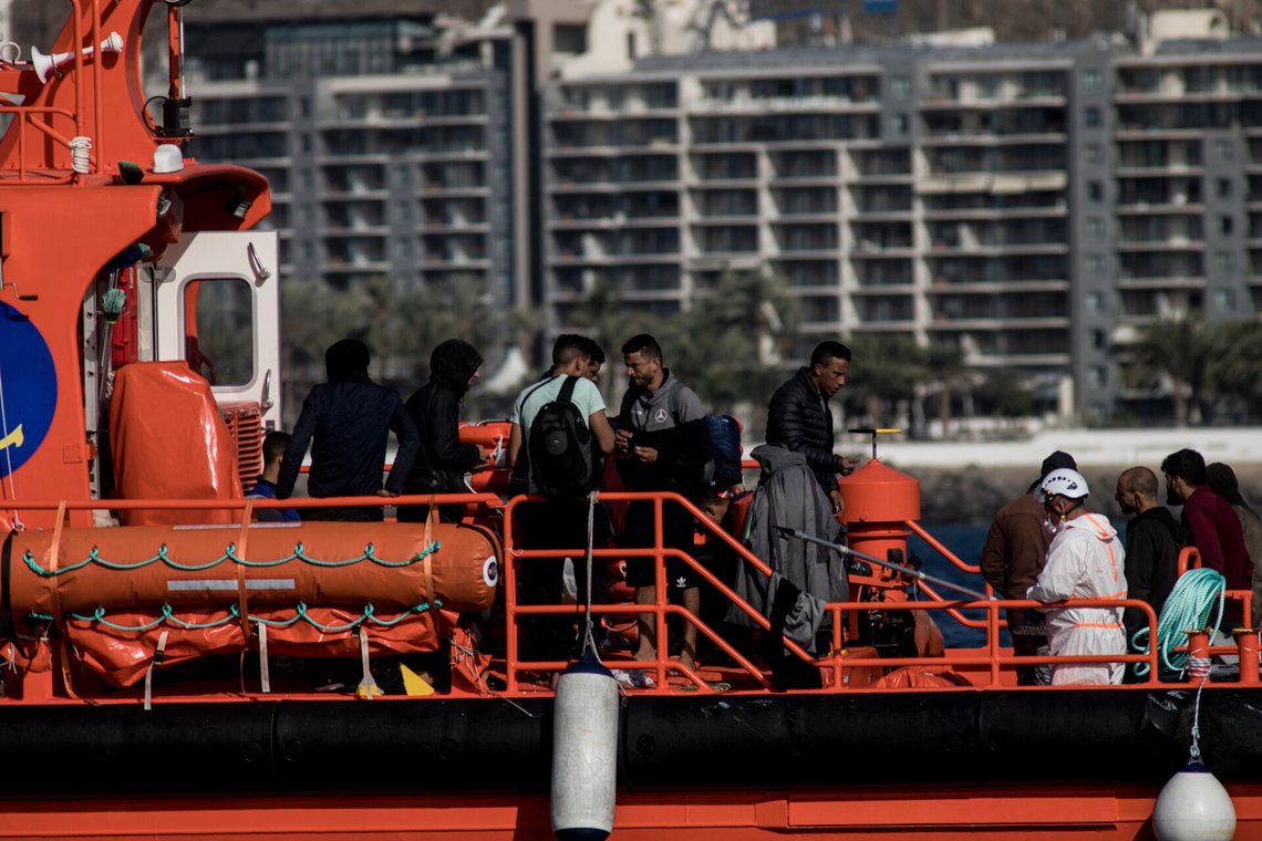 Spanish coastguards arrive in Arguineguin port carrying migrants after their rescue in Gran Canaria island, Spain on Wednesday Nov. 25, 2020. Spanish rescue services said Wednesday at least seven people died after a migrant boat carrying more than 30 people hit rocks close to a small port on the Canary Island of Lanzarote. Many of the rescued were taken to the Arguineguín dock on the southwestern coast of Gran Canaria island, where several thousand people of different origin are being kept, some in tents. (AP Photo/Javier Fergo) Spanish coastguards arrive in Arguineguin port carrying migrants after their rescue in Gran Canaria island, Spain on Wednesday Nov. 25, 2020. Spanish rescue services said Wednesday at least seven people died after a migrant boat carrying more than 30 people hit rocks close to a small port on the Canary Island of Lanzarote. Many of the rescued were taken to the Arguineguín dock on the southwestern coast of Gran Canaria island, where several thousand people of different origin are being kept, some in tents. (AP Photo/Javier Fergo)
