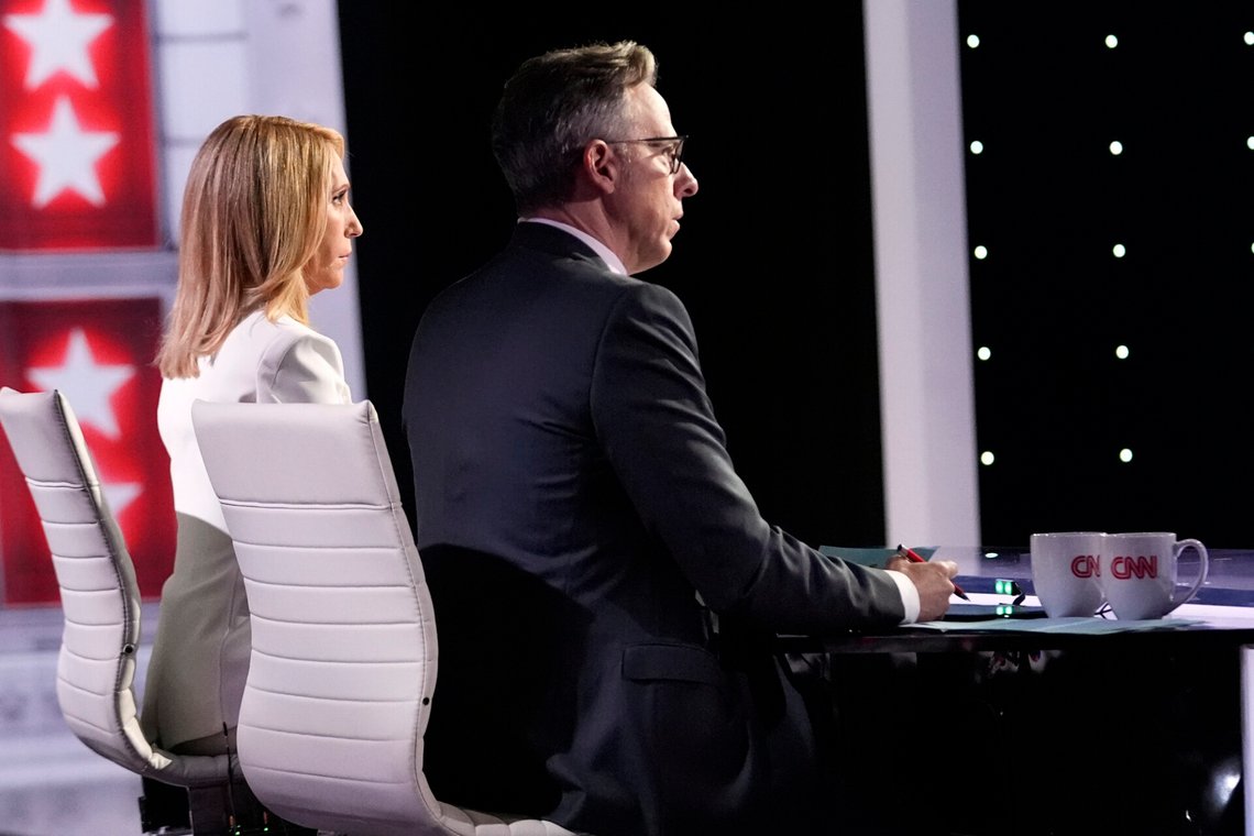 FILE _ CNN's Dana Bash, left, and Jake Tapper listen as they moderate a presidential debate between President Joe Biden and Republican presidential candidate former President Donald Trump, Thursday, June 27, 2024, in Atlanta. There were exhaustive, independent fact-checks of claims made during the CNN debate between Joe Biden and Donald Trump on Thursday, June 27, but none available to the millions of people watching the two presidents in real time. (AP Photo/Gerald Herbert, File) FILE _ CNN's Dana Bash, left, and Jake Tapper listen as they moderate a presidential debate between President Joe Biden and Republican presidential candidate former President Donald Trump, Thursday, June 27, 2024, in Atlanta. There were exhaustive, independent fact-checks of claims made during the CNN debate between Joe Biden and Donald Trump on Thursday, June 27, but none available to the millions of people watching the two presidents in real time. (AP Photo/Gerald Herbert, File)