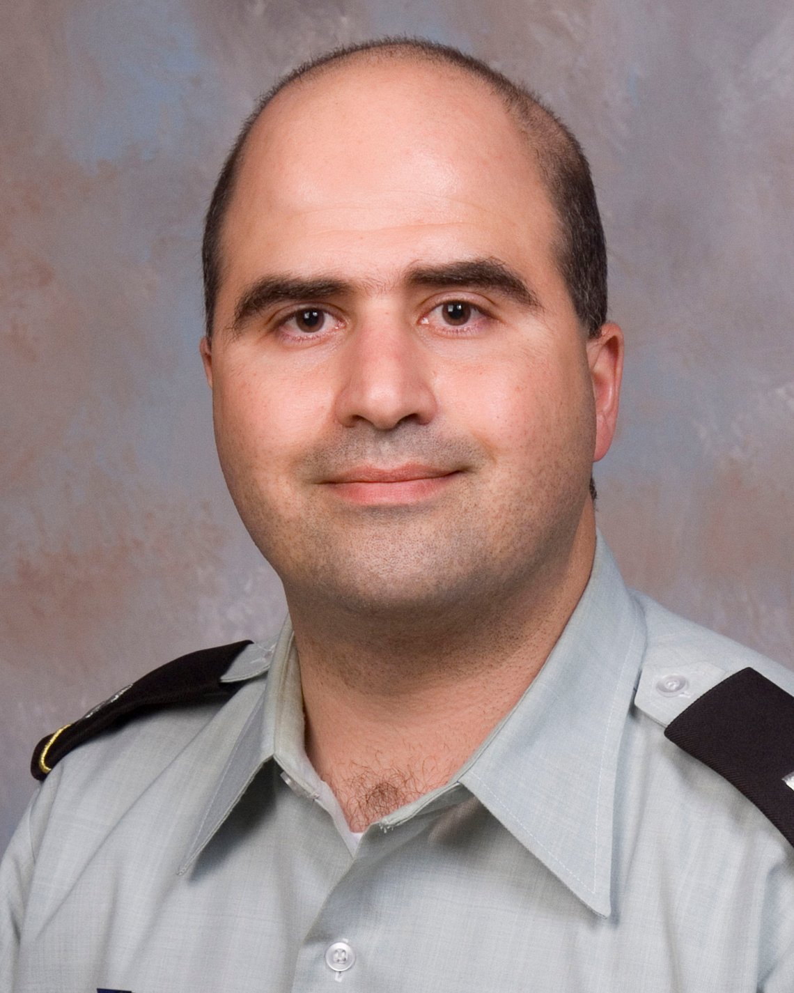 FILE - The 2007 file photo provided by the Uniformed Services University of the Health Sciences (USUHS) shows Maj. Nidal Malik Hasan when he undertook the Disaster and Military Psychiatry Fellowship program. Nine Army officers are being reprimanded for leadership failures in connection with the shooting rampage at Fort Hood, Texas, and their failure to detect and report problems with the accused shooter, Hasan, as he moved along in his medical career. Saying that although no single event directly led to the tragedy, Army Secretary John McHugh found that certain officers failed to meet expected standards, an Army statement said Thursday, March 10, 2011. (AP Photo/USUHS, File) FILE - The 2007 file photo provided by the Uniformed Services University of the Health Sciences (USUHS) shows Maj. Nidal Malik Hasan when he undertook the Disaster and Military Psychiatry Fellowship program. Nine Army officers are being reprimanded for leadership failures in connection with the shooting rampage at Fort Hood, Texas, and their failure to detect and report problems with the accused shooter, Hasan, as he moved along in his medical career. Saying that although no single event directly led to the tragedy, Army Secretary John McHugh found that certain officers failed to meet expected standards, an Army statement said Thursday, March 10, 2011. (AP Photo/USUHS, File)