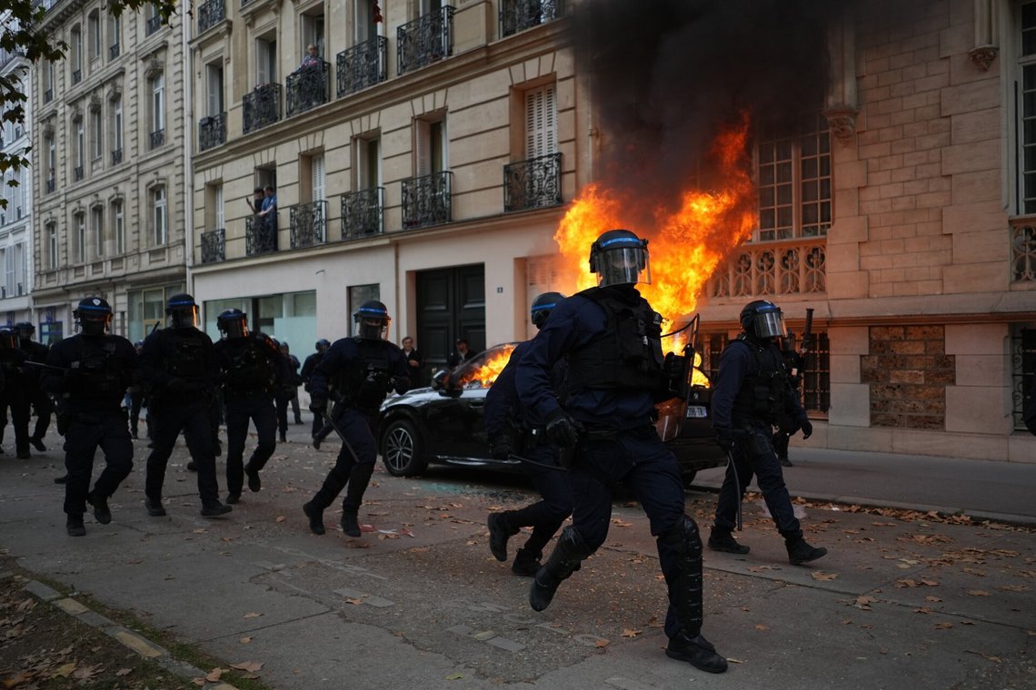 Police run towards students during a march to protest against under-resourced schools in Paris, Tuesday Oct. 13, 2026. (AP Photo/Thibault Camus) Police run towards students during a march to protest against under-resourced schools in Paris, Tuesday Oct. 13, 2026. (AP Photo/Thibault Camus)