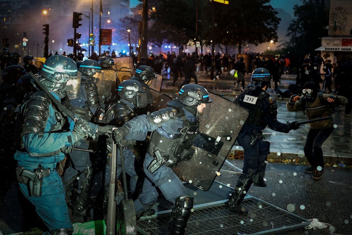 TOPSHOT - French Police in riot gear operate during a demonstration in favor of purchasing power, the protection of public services, and fiscal and social justice, in Paris on October 24, 2026 as part of a nationwide call for mobilisation bringing together former members of the Yellow Vest movement, labor unions, high school and university students. Protests by high school students over learning conditions sparked a movement that has since spread nationwide, fuelled by broader anger over the rising cost of living. About 70,000 security personnel will be deployed on October 24, 2026, Interior Minister said at a news conference, warning that calls for violence and looting were circulating on social media. (Photo by Sameer AL-DOUMY / AFP) TOPSHOT - French Police in riot gear operate during a demonstration in favor of purchasing power, the protection of public services, and fiscal and social justice, in Paris on October 24, 2026 as part of a nationwide call for mobilisation bringing together former members of the Yellow Vest movement, labor unions, high school and university students. Protests by high school students over learning conditions sparked a movement that has since spread nationwide, fuelled by broader anger over the rising cost of living. About 70,000 security personnel will be deployed on October 24, 2026, Interior Minister said at a news conference, warning that calls for violence and looting were circulating on social media. (Photo by Sameer AL-DOUMY / AFP)