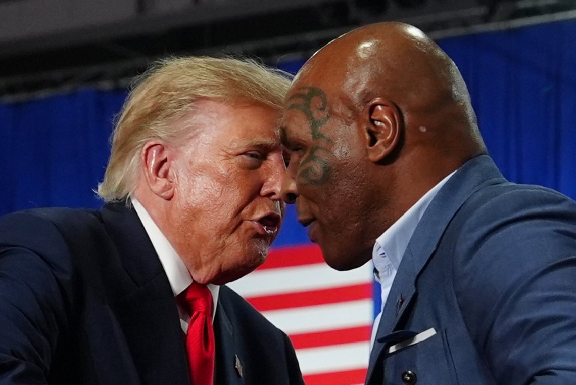 President Donald Trump greets Mike Tyson at a campaign rally at the Oncenter, Friday, Oct. 9, 2026, in Syracuse, N.Y. (AP Photo/Julia Demaree Nikhinson) President Donald Trump greets Mike Tyson at a campaign rally at the Oncenter, Friday, Oct. 9, 2026, in Syracuse, N.Y. (AP Photo/Julia Demaree Nikhinson)