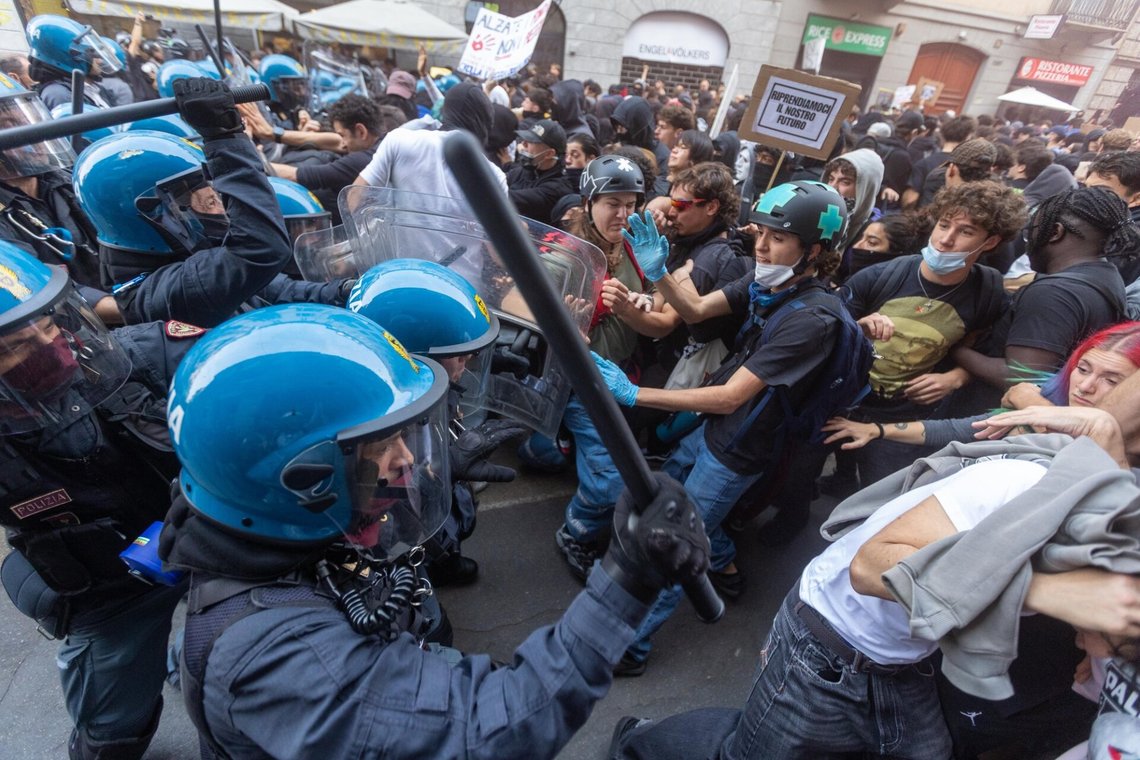 Demonstrators and riot police clash during a protest against the high cost of living, in Milan, Italy, Saturday Oct. 17, 2026. (Stefano Porta/LaPresse via AP) Demonstrators and riot police clash during a protest against the high cost of living, in Milan, Italy, Saturday Oct. 17, 2026. (Stefano Porta/LaPresse via AP)