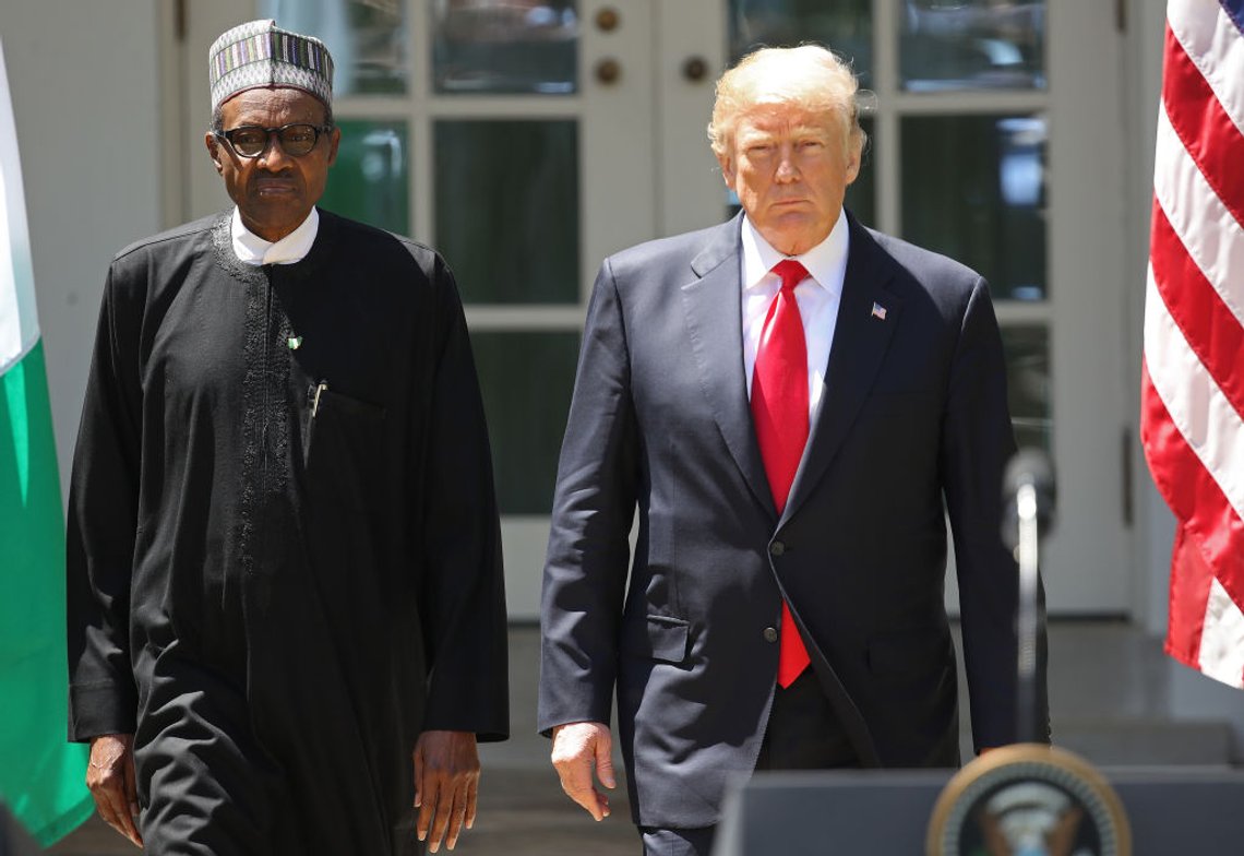 WASHINGTON, DC - APRIL 30: U.S. President Donald Trump (R) and Nigerian President Muhammadu Buhari (L) arrive for a joint press conference in the Rose Garden of the White House April 30, 2018 in Washington, DC. The two leaders also met in the Oval Office to discuss a range of bilateral issues earlier in the day. (Photo by Win McNamee/Getty Images) WASHINGTON, DC - APRIL 30: U.S. President Donald Trump (R) and Nigerian President Muhammadu Buhari (L) arrive for a joint press conference in the Rose Garden of the White House April 30, 2018 in Washington, DC. The two leaders also met in the Oval Office to discuss a range of bilateral issues earlier in the day. (Photo by Win McNamee/Getty Images)