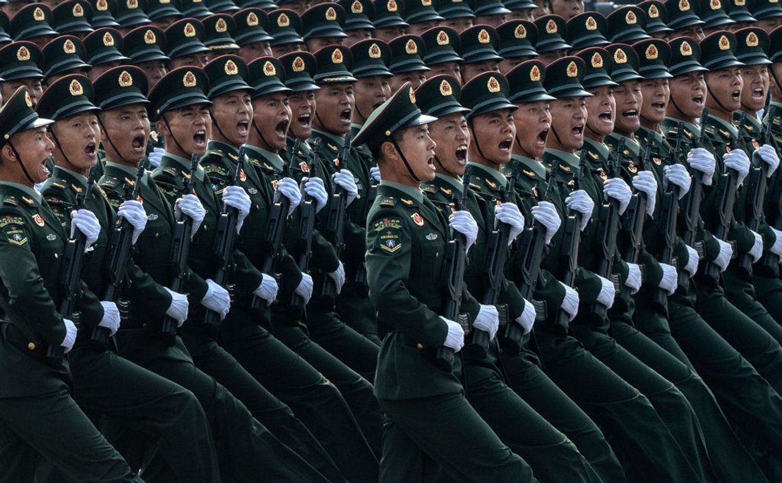 BEIJING, CHINA - OCTOBER 01: Chinese soldiers shout as they march in formation during a parade to celebrate the 70th Anniversary of the founding of the People's Republic of China at Tiananmen Square in 1949, on October 1, 2019 in Beijing, China. (Photo by Kevin Frayer/Getty Images) BEIJING, CHINA - OCTOBER 01: Chinese soldiers shout as they march in formation during a parade to celebrate the 70th Anniversary of the founding of the People's Republic of China at Tiananmen Square in 1949, on October 1, 2019 in Beijing, China. (Photo by Kevin Frayer/Getty Images)