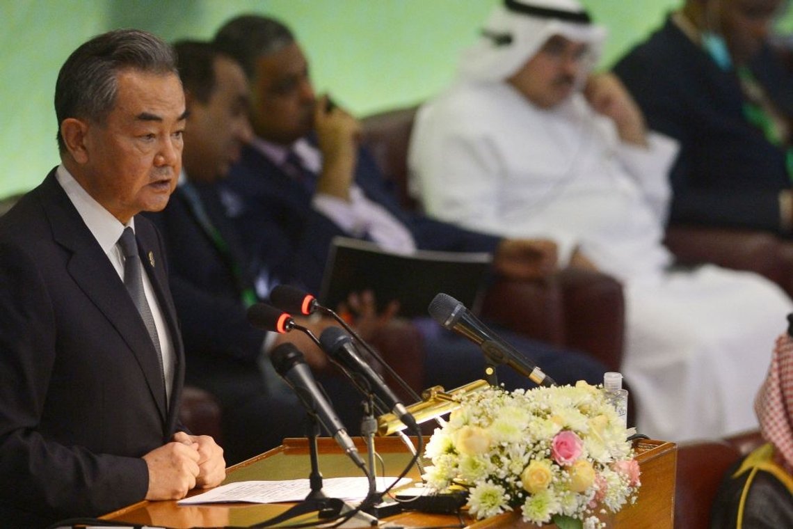 Chinese Foreign minister Wang Yi (L) speaks during the 48th session of the Organization of Islamic Cooperation (OIC) Council of Foreign Ministers, in Islamabad on March 22, 2022. (Photo by Farooq NAEEM / AFP) (Photo by FAROOQ NAEEM/AFP via Getty Images) Chinese Foreign minister Wang Yi (L) speaks during the 48th session of the Organization of Islamic Cooperation (OIC) Council of Foreign Ministers, in Islamabad on March 22, 2022. (Photo by Farooq NAEEM / AFP) (Photo by FAROOQ NAEEM/AFP via Getty Images)