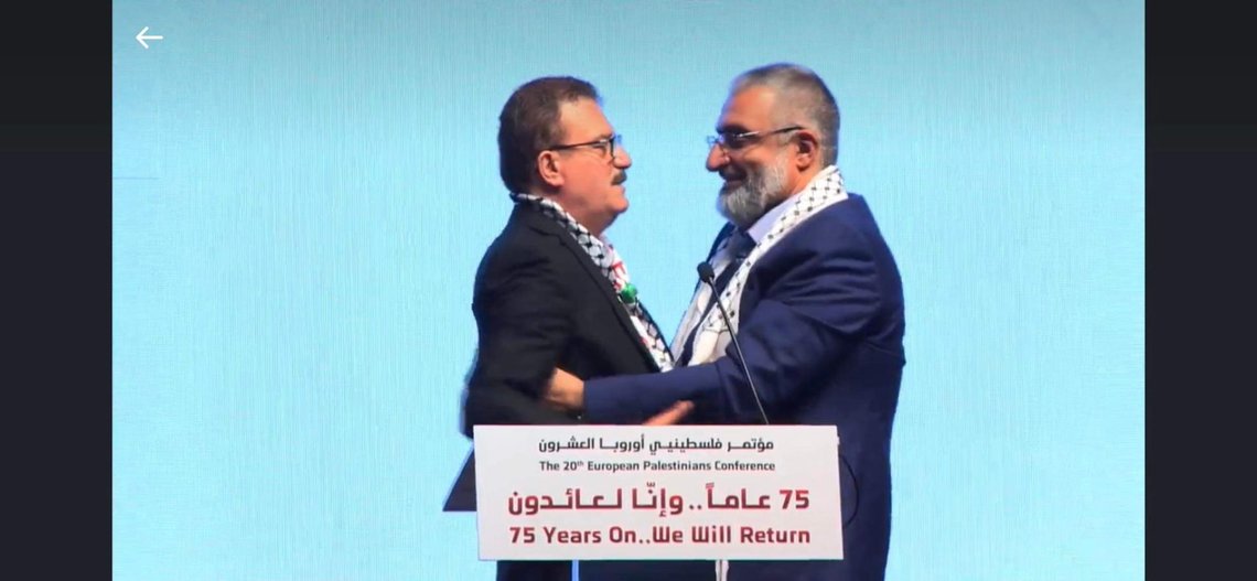 Socialdemokratiska riksdagsledamoten Jamal El-Haj - suppleant i utrikesutskottet - av omfamnas av Amin Abu Rashid, en av Hamas ledare i Europa, efter sitt anförande på Malmökonferensen. Socialdemokratiska riksdagsledamoten Jamal El-Haj - suppleant i utrikesutskottet - av omfamnas av Amin Abu Rashid, en av Hamas ledare i Europa, efter sitt anförande på Malmökonferensen.