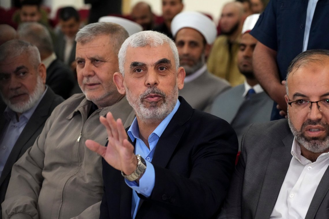 FILE - Yahya Sinwar, head of Hamas in Gaza, greets his supporters upon his arrival at a meeting in a hall on the sea side of Gaza City, on April 30, 2022. Since Hamas fighters carried out the deadliest attack on Israel in decades, Israeli officials have vowed to crush the Palestinian militant group and its enigmatic leader in Gaza, Yahya Sinwar. But seven weeks into the war, 61-year-old Sinwar remains alive, in hiding and at the helm of Hamas’ fighters as they battle Israeli forces. (AP Photo/Adel Hana, File) FILE - Yahya Sinwar, head of Hamas in Gaza, greets his supporters upon his arrival at a meeting in a hall on the sea side of Gaza City, on April 30, 2022. Since Hamas fighters carried out the deadliest attack on Israel in decades, Israeli officials have vowed to crush the Palestinian militant group and its enigmatic leader in Gaza, Yahya Sinwar. But seven weeks into the war, 61-year-old Sinwar remains alive, in hiding and at the helm of Hamas’ fighters as they battle Israeli forces. (AP Photo/Adel Hana, File)