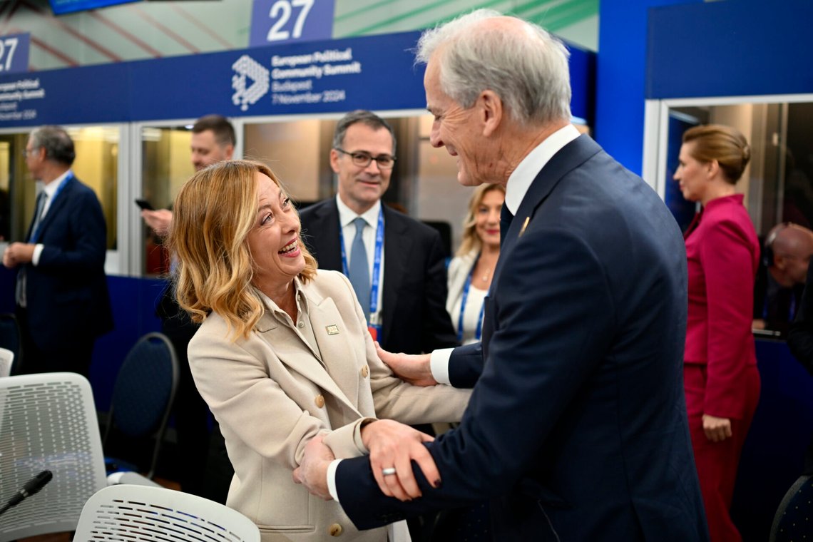 Italy's Prime Minister Giorgia Meloni, left, greets Norway's Prime Minister Jonas Gahr Store at a plenary session during the European Political Community (EPC) Summit at the Puskas Arena in Budapest, Thursday, Nov. 7, 2024. (AP Photo/Denes Erdos) Italy's Prime Minister Giorgia Meloni, left, greets Norway's Prime Minister Jonas Gahr Store at a plenary session during the European Political Community (EPC) Summit at the Puskas Arena in Budapest, Thursday, Nov. 7, 2024. (AP Photo/Denes Erdos)