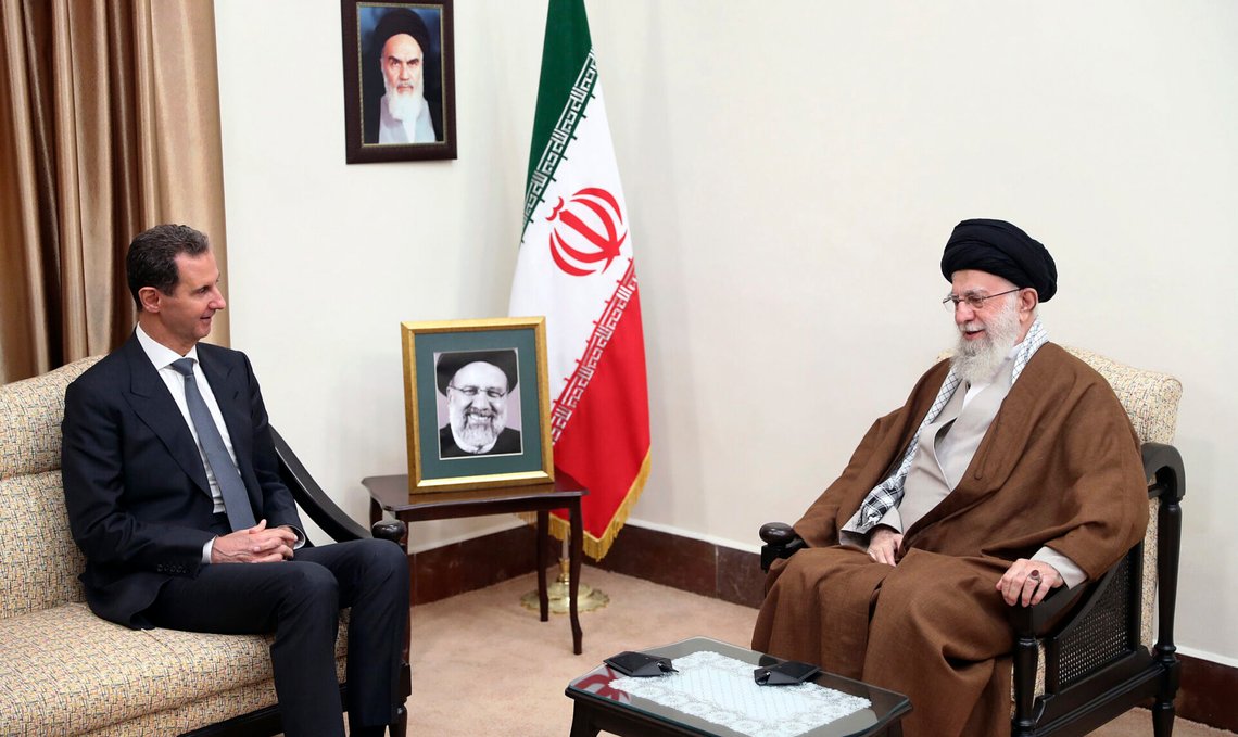 FILE - In this photo released by the official website of the office of the Iranian supreme leader, Supreme Leader Ayatollah Ali Khamenei, right, speaks with Syrian President Bashar Assad in a meeting in Tehran, Iran, Thursday, May 30, 2024. (Office of the Iranian Supreme Leader via AP, File) FILE - In this photo released by the official website of the office of the Iranian supreme leader, Supreme Leader Ayatollah Ali Khamenei, right, speaks with Syrian President Bashar Assad in a meeting in Tehran, Iran, Thursday, May 30, 2024. (Office of the Iranian Supreme Leader via AP, File)