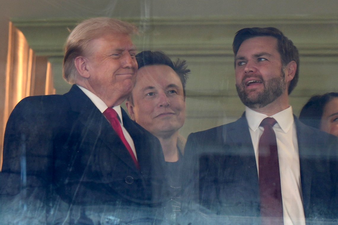 President-elect Donald Trump, from left, Trump's pick for the planned Department of Government Efficiency Elon Musk and Vice President-elect JD Vance attend the NCAA college football game between Army and Navy at Northwest Stadium in Landover, Md., Saturday, Dec. 14, 2024. (AP Photo/Stephanie Scarbrough) President-elect Donald Trump, from left, Trump's pick for the planned Department of Government Efficiency Elon Musk and Vice President-elect JD Vance attend the NCAA college football game between Army and Navy at Northwest Stadium in Landover, Md., Saturday, Dec. 14, 2024. (AP Photo/Stephanie Scarbrough)