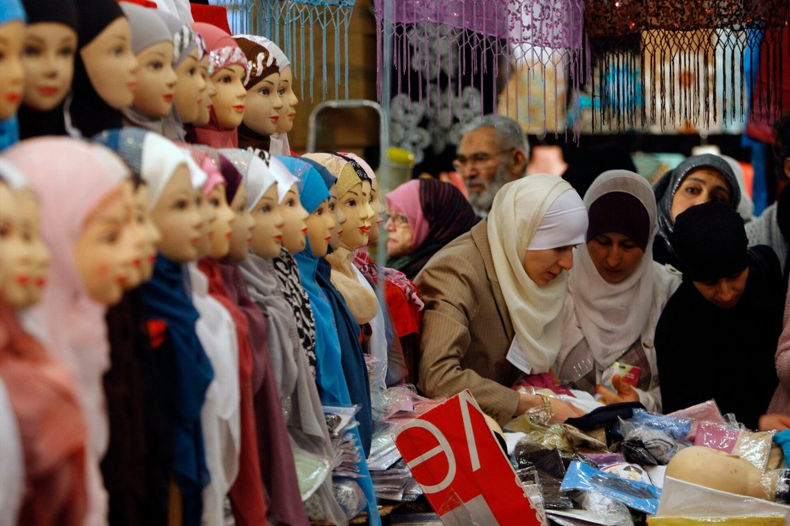 Women look at veils, inside an exhibition hall during the 27th annual meeting of French Muslims, in Le Bourget, outside Paris, Sunday, April 4, 2010. (AP Photo/Christophe Ena) Women look at veils, inside an exhibition hall during the 27th annual meeting of French Muslims, in Le Bourget, outside Paris, Sunday, April 4, 2010. (AP Photo/Christophe Ena)