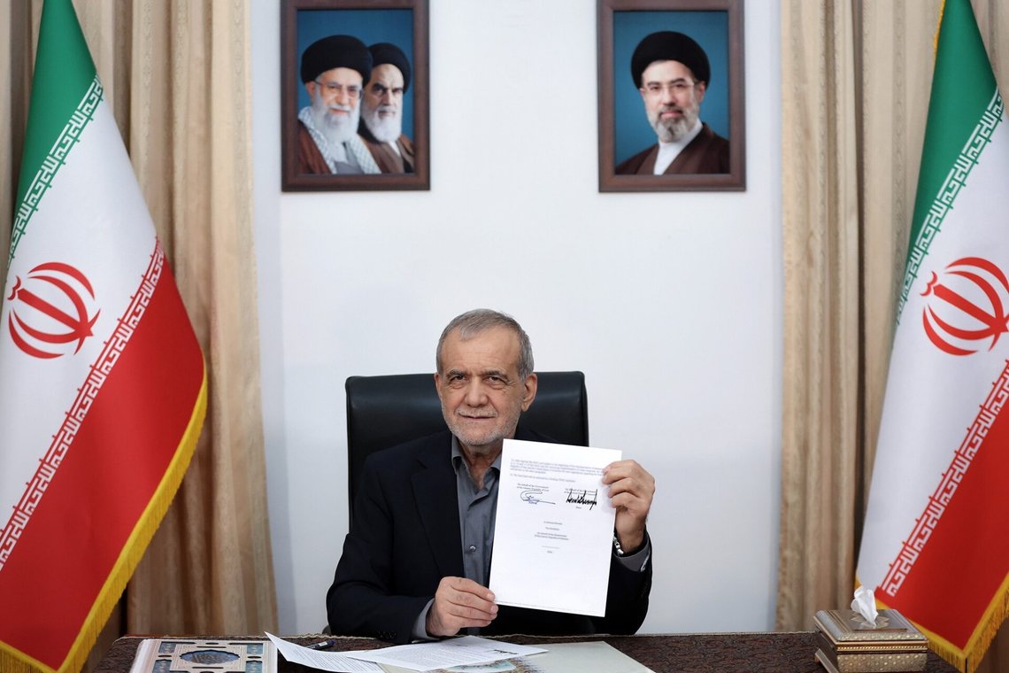 In this photo provided by the Islamic Republic News Agency (IRNA) Iranian President Masoud Pezeshkian displays a memorandum of understanding signed with U.S. President Donald Trump aimed at ending the war and launching negotiations on a broader agreement, in Tehran, Iran, early Thursday, June 18, 2026.(Iranian Presidency Office via AP) In this photo provided by the Islamic Republic News Agency (IRNA) Iranian President Masoud Pezeshkian displays a memorandum of understanding signed with U.S. President Donald Trump aimed at ending the war and launching negotiations on a broader agreement, in Tehran, Iran, early Thursday, June 18, 2026.(Iranian Presidency Office via AP)