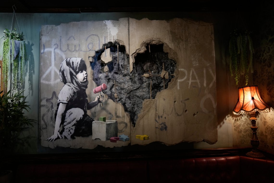 The Walled Off Hotel, designed by anonymous street artist Banksy and now an independent business, reopens its doors after more than two years closure following the Gaza war, in the West Bank city of Bethlehem, Tuesday, Dec. 23, 2025. (AP Photo/Nasser Nasser) The Walled Off Hotel, designed by anonymous street artist Banksy and now an independent business, reopens its doors after more than two years closure following the Gaza war, in the West Bank city of Bethlehem, Tuesday, Dec. 23, 2025. (AP Photo/Nasser Nasser)
